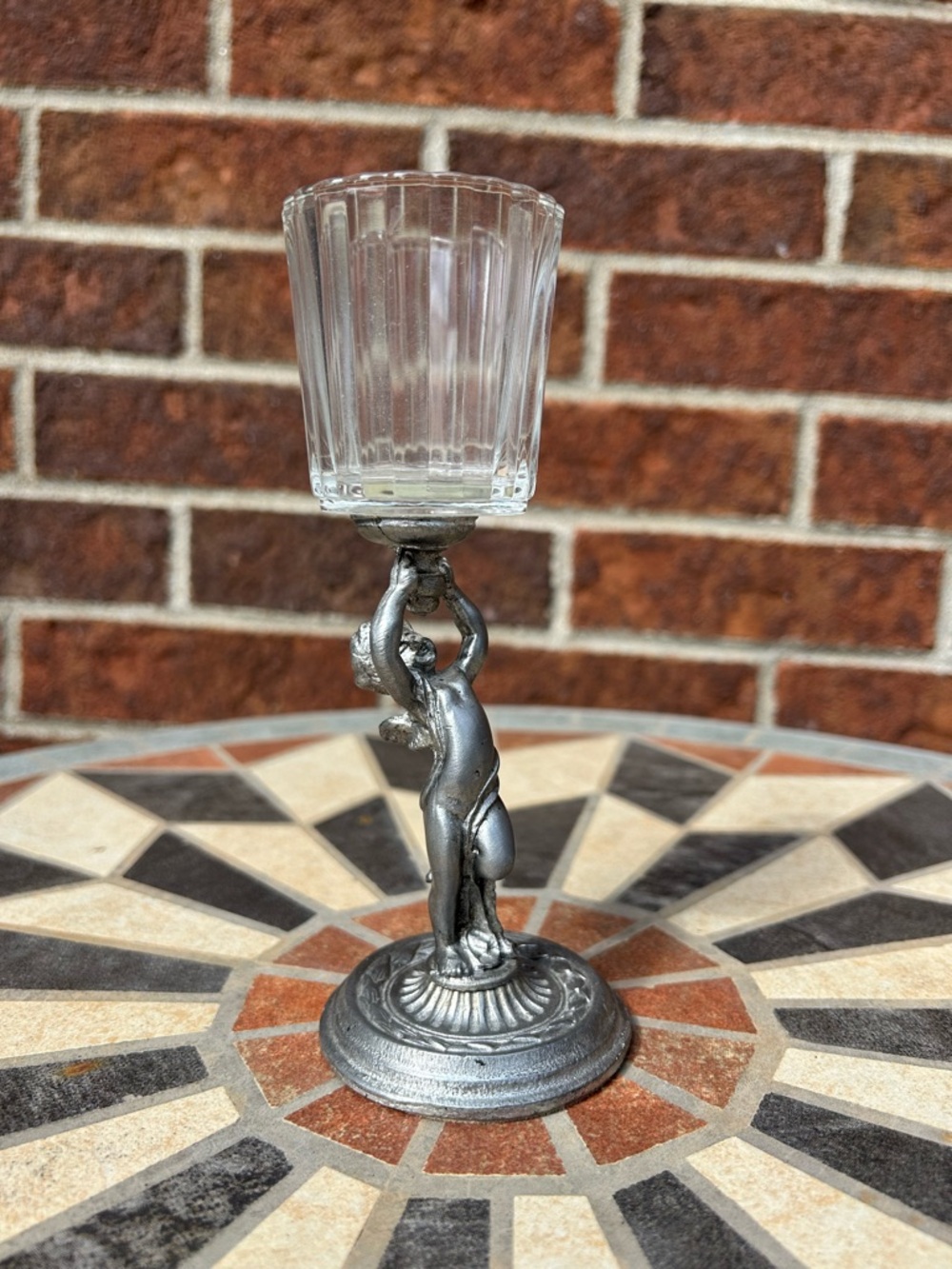 Cherub pewter candle holder